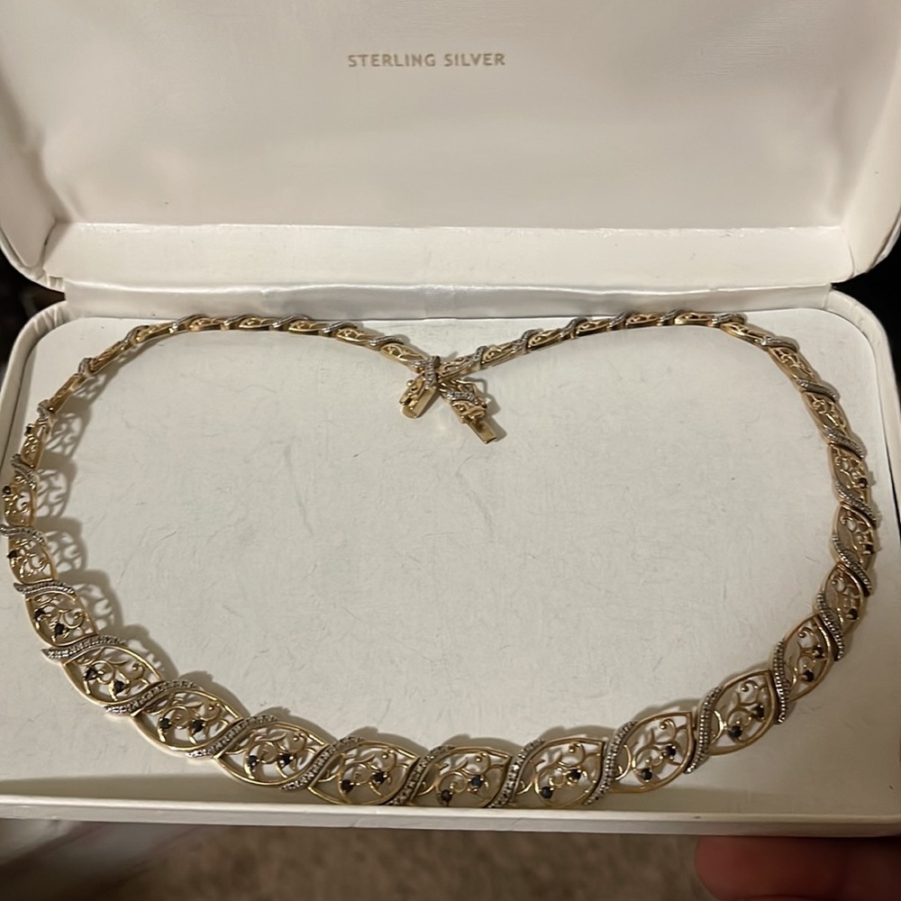 Gold necklace with sapphire and diamond stones